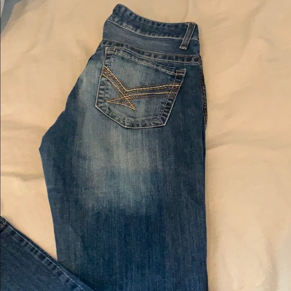 Long cinch blue jeans